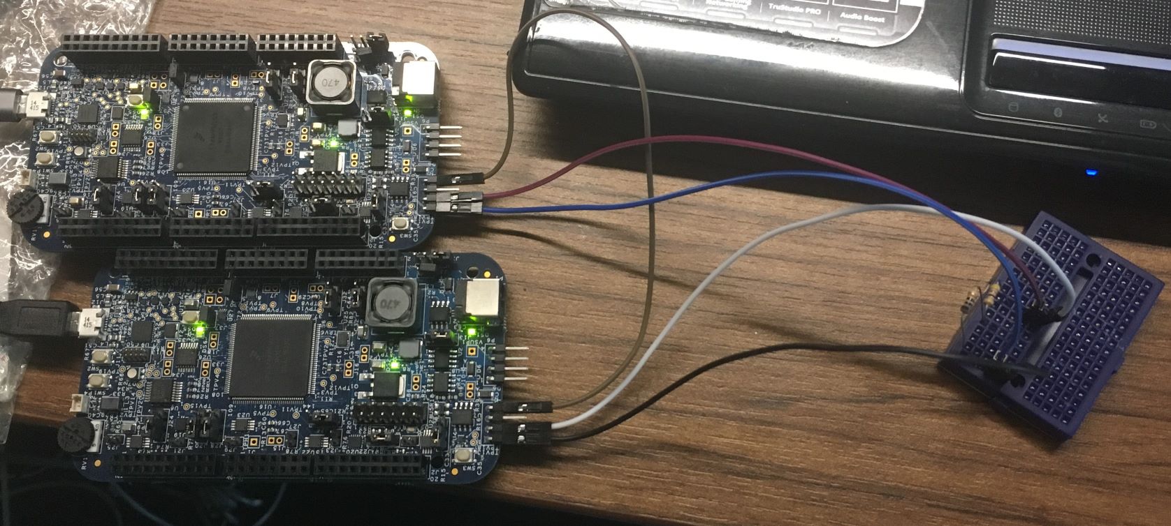 The physical connections between the two boards, with the termination circuit on the breadboard.